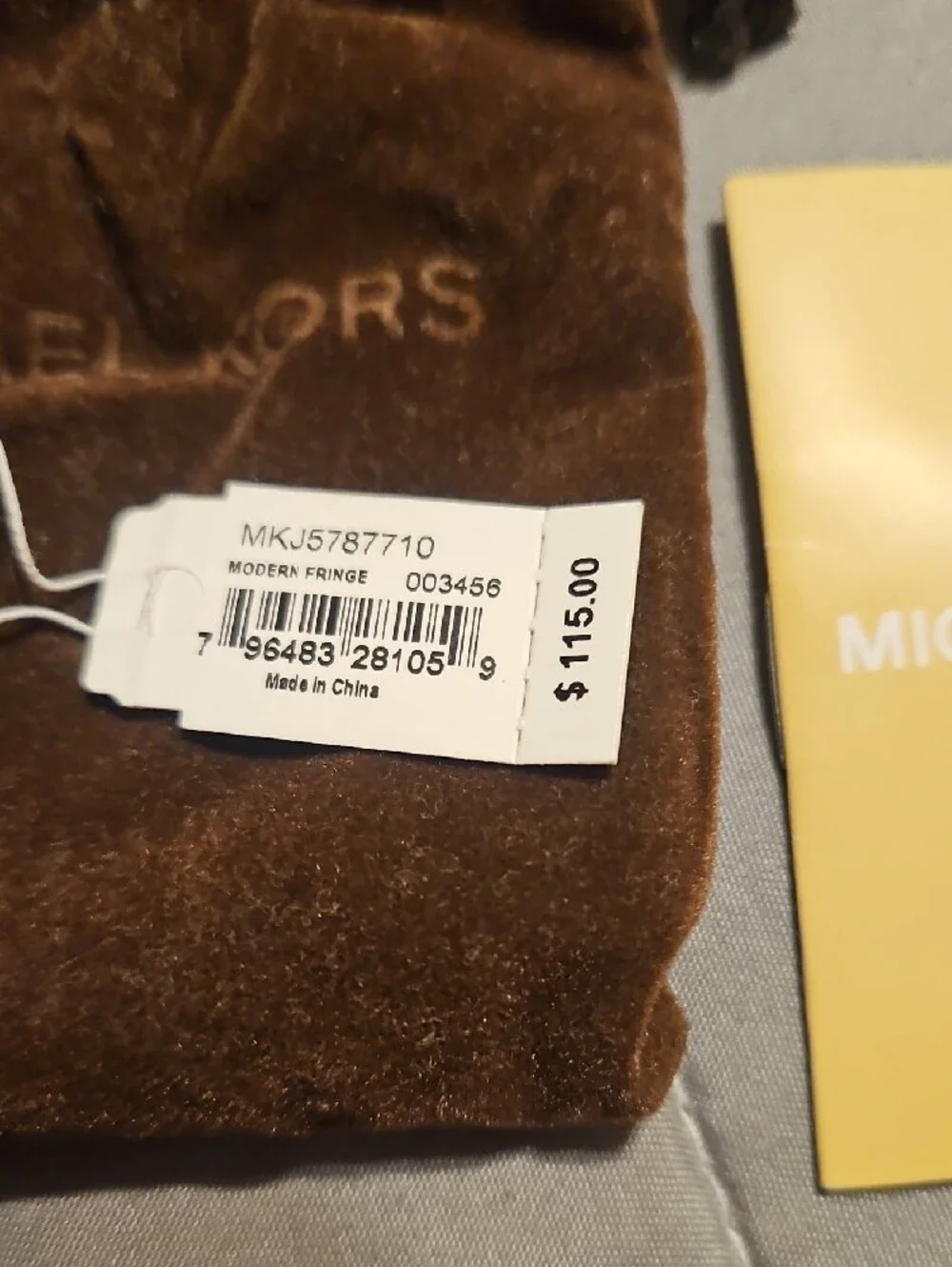 Michael Kors gold tone